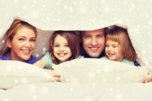 Comfort Happy Family Covered In Blanket Shutterstock 330588140